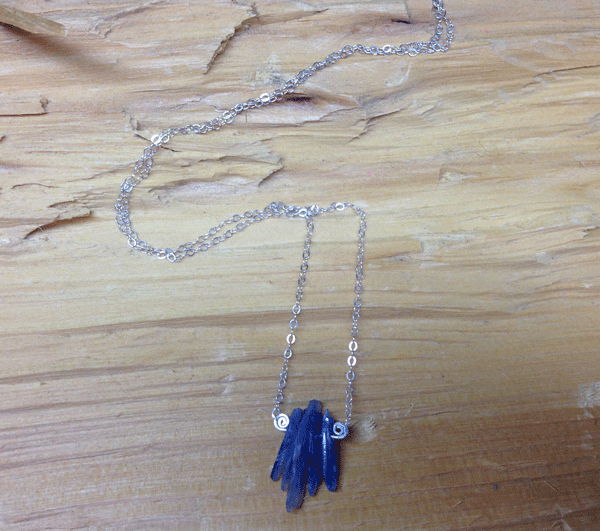 Blue kyanite chips on an 18" sterling silver chain. Other sizes available. $35