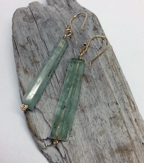 Rough cut green kyanite stones on gold filled wire. Stones are ~35mm.