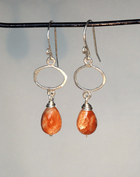 The tiny copper inclusions in these sunstones  pick up the summer light beautifully. Stones are 10mm long. All silver is sterling. $47