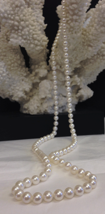 Hand tied pearls that can be worn as a long necklace or wrapped to look like a double strand. $135
